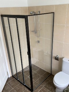 Corner-fully-framed-sliding-left-door-shower-screen